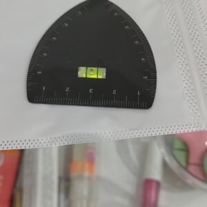 Regla medidora con nivel